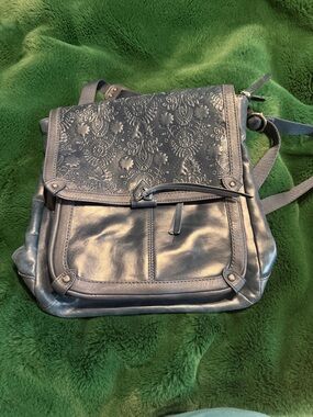 The Sak Embossed Floral Flap Backpack - Metallic Gray
